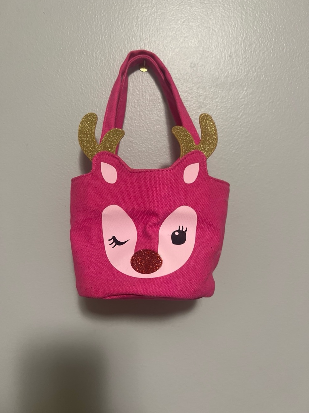 Pink reindeer gift bag